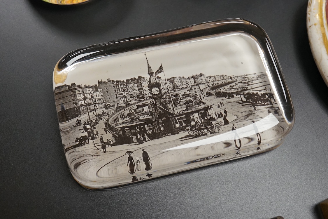 Six pictorial glass gem paperweights and three 19th century scent bottles, largest 11cm in length